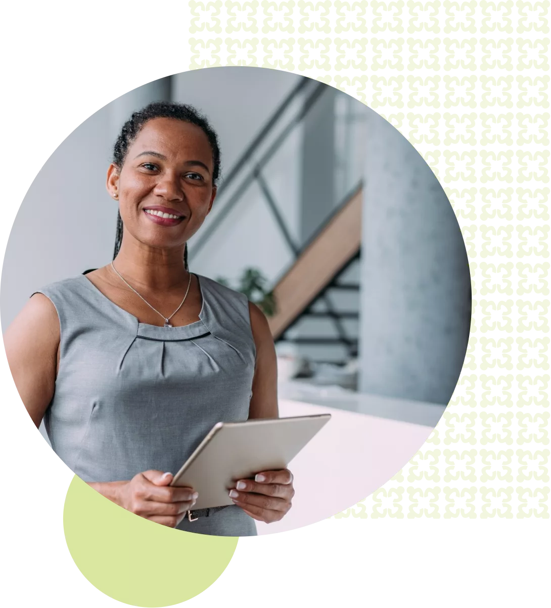 woman holding a piece of paper and smiling